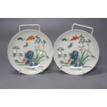 A pair of Chinese enamelled porcelain saucer dishes, 16cm diameter