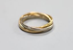 A modern three colour 18ct gold 'Russian' triple band wedding ring, size O,5.6 grams.