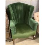 A George III mahogany wing armchair, on squared tapered legs, width 75cm