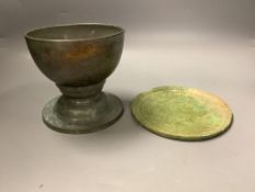 A Cambodian bronze ritual water bowl and stand and a similar mirror, Khmer, 12th/13th