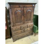 A mid 18th century oak two part bow fronted Dower chest / linen press, with doors enclosing shelves