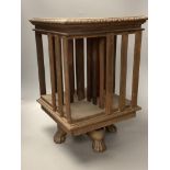 A small Indian rosewood table top revolving bookcase.