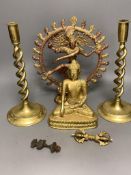 A Bronze Buddha, Indian tantric figure, a pair of brass candlesticks etc.
