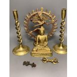 A Bronze Buddha, Indian tantric figure, a pair of brass candlesticks etc.