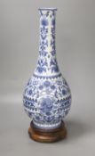 A Dutch porcelain blue and white long necked bottle vase