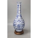 A Dutch porcelain blue and white long necked bottle vase