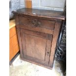 A 17th century Welsh oak single door cupboard, width 67cm, depth 32cm, height 90cm