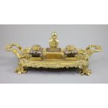 A Victorian ormolu ink stand, width 17.5in. depth 9in. height 6in.