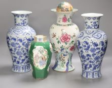 A pair of blue and white Chinese vases, height 31cm, and two others