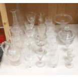 A collection of assorted mixed cut and etched glassware