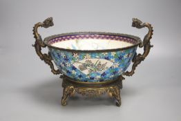 A 19th century French ormolu mounted faience bowl on ornate dragon design stand, 23cm high