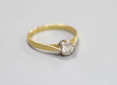 An 18ct and solitaire diamond ring,size Q, gross weight 2.5 grams, the stone weighing approximately