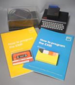 A Sinclair ZX81 personal computer, with tapes and instruction booklet