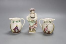 A 19th century Berlin figure, 14cm high and two small jugs