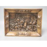 A 19th century Continental relief carved fruitwood plaque depicting a procession, 39 x 30cm