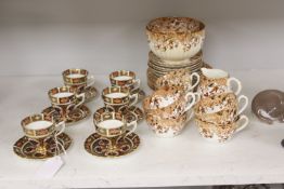A set of six Royal Crown Derby Imari pattern coffee cups and saucers, height 6.5cm, and a quantity