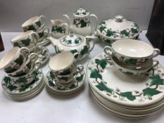 A Wedgwood 'Napoleon Ivy' pattern part dinner service