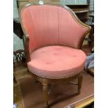 A Victorian oak revolving desk chair, by Waring & Sons Ltd of London, width 57cm