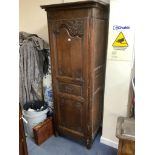 A small provincial French oak armoire, 18th century, width 80cm, depth 58cm, height 203cm