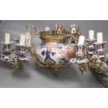 A 19th century spelter and Imari three branch chandelier, converted to electric, each branch with