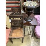 A Victorian Aesthetic movement carved oak hall seat, another carved oak chair, a tile top