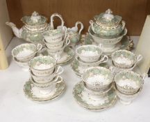 An English porcelain eau-de-nil gilt decorated tea service, c.1840