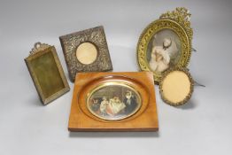 A Victorian framed miniature (snuff box lid) of children in a nursery, another miniature and three