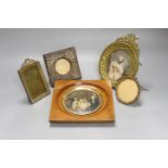 A Victorian framed miniature (snuff box lid) of children in a nursery, another miniature and three