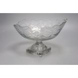 A George III Irish oval cut glass fruit bowl, lemon squeezer base, 27cm long (a.f)