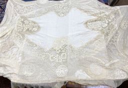 An Edwardian hand made lace bedspread. Hand sewn using finely spun lawn, decorated with