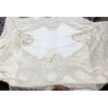 An Edwardian hand made lace bedspread. Hand sewn using finely spun lawn, decorated with