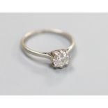 A white metal (stamped plat) and solitaire diamond ring,size M, gross weight 2.6 grams, the stone