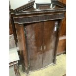 A George III oak hanging corner cabinet, width 90cm, depth 50cm, height 136cm