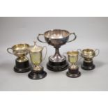 A collection of five small silver presentation trophy cups,largest 10.8cm, 14oz.