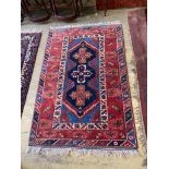 A Caucasian design rug, 184 x 120cm