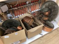 A large mixed collection of antique copper wares to include saucepans, kettles, etc.