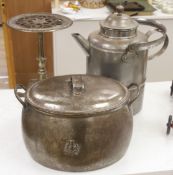 A metal trivet, a lidded pot and a kettle, tallest 43cm