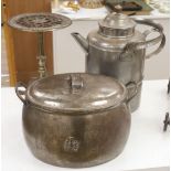 A metal trivet, a lidded pot and a kettle, tallest 43cm