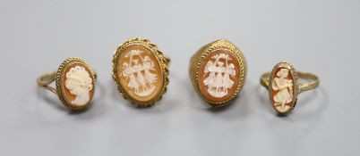 Four assorted modern 9ct and cameo shell dress rings including one carved with The Three Graces,