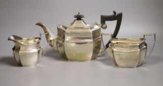 A George V silver three piece tea set, Mappin & Webb, Sheffield 1927,gross weight 35oz.