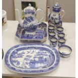 A Wedgwood blue and white willow pattern meat dish, a Copeland Spode Tower pattern square shaped