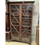 A George III mahogany bookcase with two astragal glazed doors, on later feet, width 116cm