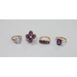 Three assorted 9ct and amethyst set dress rings, including amethyst and diamond and amethyst