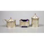 A George VI silver three piece condiment set, by Walker & Hall, Sheffield, 1937.