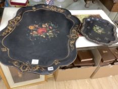 A Victorian papier mache shaped tray with painted floral panel with mother of pearl and a smaller