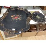 A Victorian papier mache shaped tray with painted floral panel with mother of pearl and a smaller