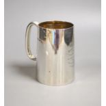 A George V silver pint mug by Atkins Bros, Sheffield, 1933, height 12.8 , 11.5oz.