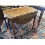 A George III rosewood banded and inlaid mahogany oval Pembroke table, width 79cm depth 49cm, height