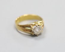 A yellow metal and illusion set solitaire diamond ring, size H, gross 4.4 grams,the stone weighing