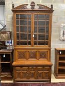 A large Victorian oak secretaire bookcase, width 144cm, depth 61cm, height 290cm, believed to